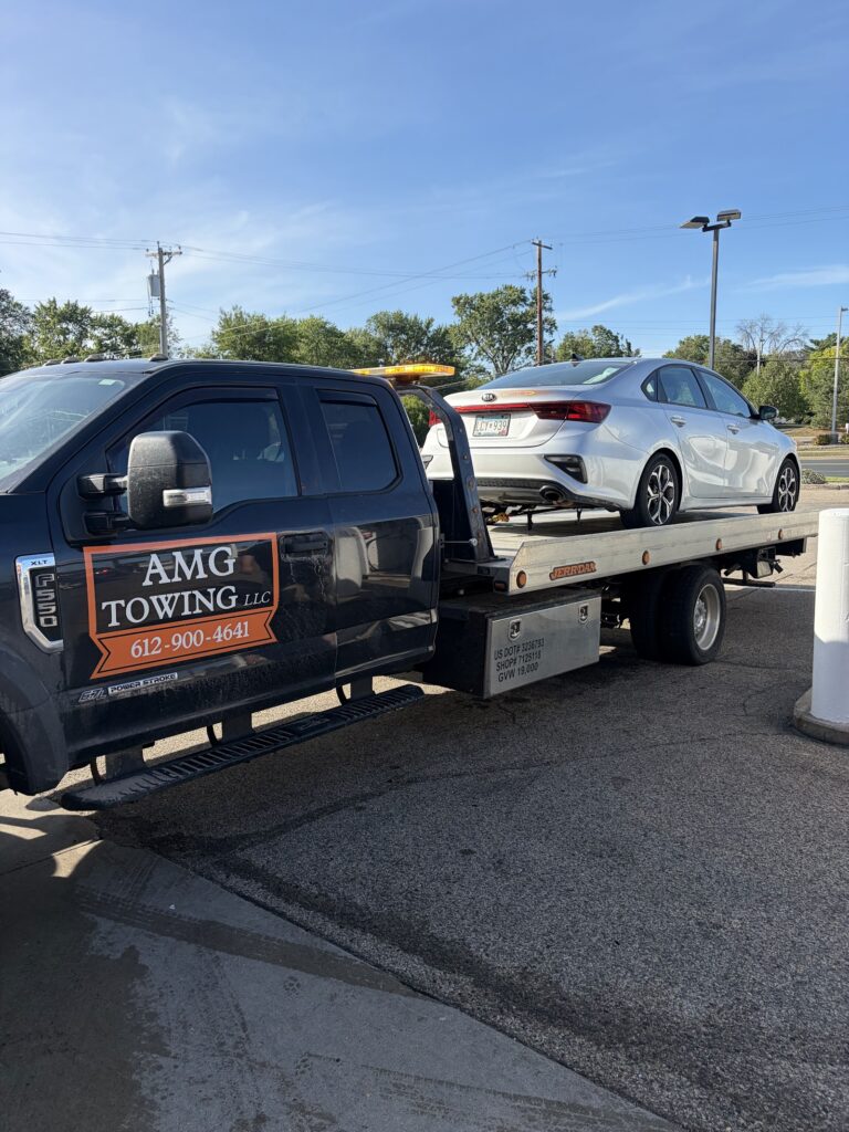 AMG Towing LLC tow truck providing towing services in Minneapolis