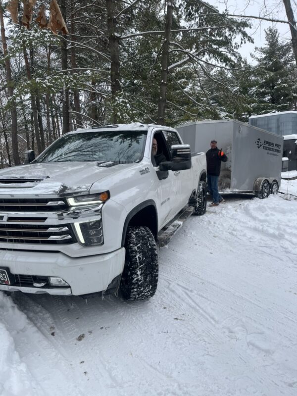 Winter roadside emergency in the snow, AMG Towing LLC